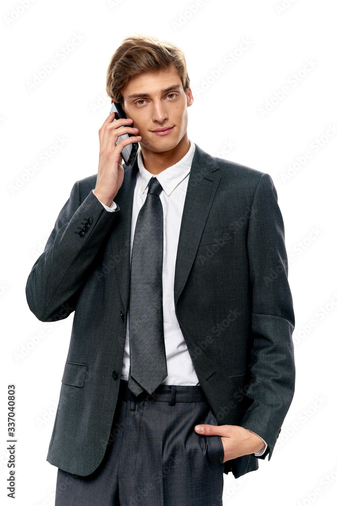 young businessman talking on the phone young businessman talking on the phone