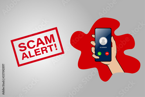 Scam alert, hand holding phone a call from scammer