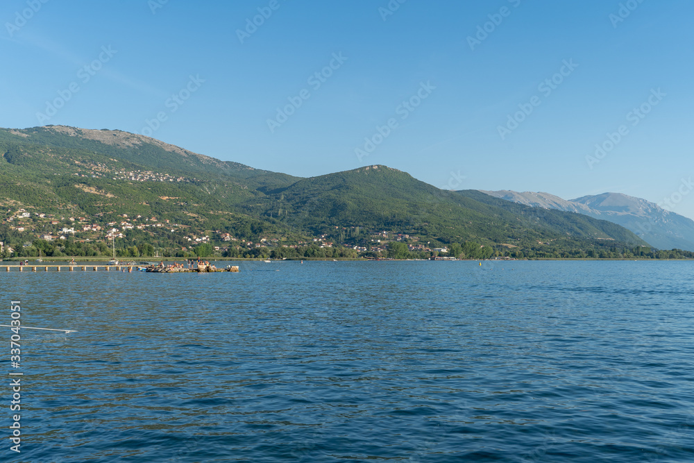Ohrid, North Macedonia: lake and mountains and beautiful blue sky. August, 2019