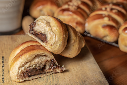 Cuadro en lienzo Delicious french sweet baked brioche buns, stuffed with chocolate and nuts