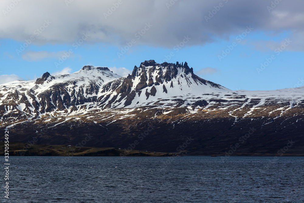 snow-covered majestic mountains near the ocean. The Landscape Of Iceland