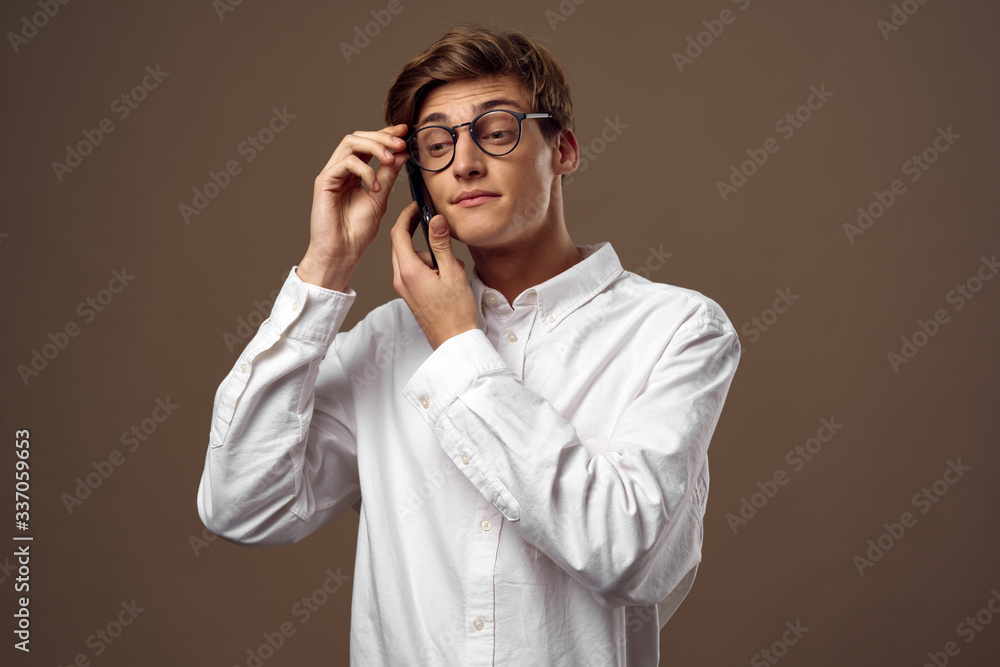 young man talking on the phone young man talking on the phone