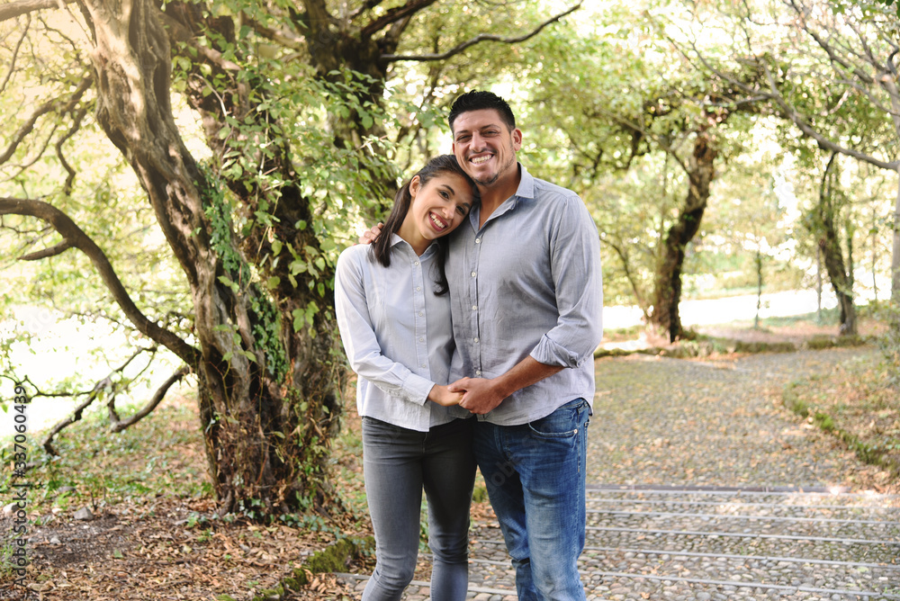 Fototapeta premium Lovely Pair Hugging in a Park