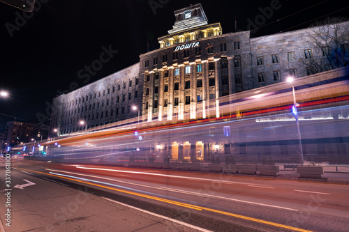 Traffic light trails in front of the largest Post office in Serbia