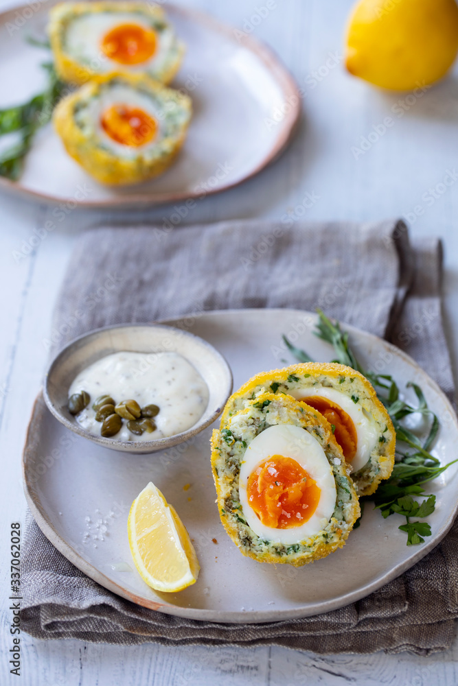 Scotch eggs wrapped with smoked haddock and cod Scotch eggs wrapped with smoked haddock and cod
