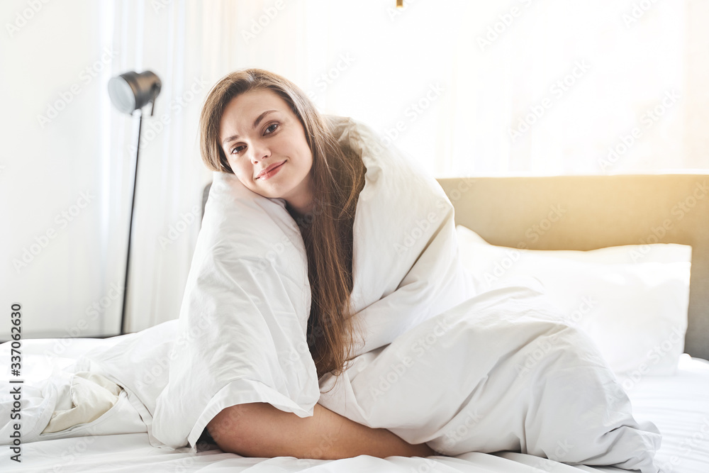 Tranquil pleased girl looking at the camera Tranquil pleased girl looking at the camera