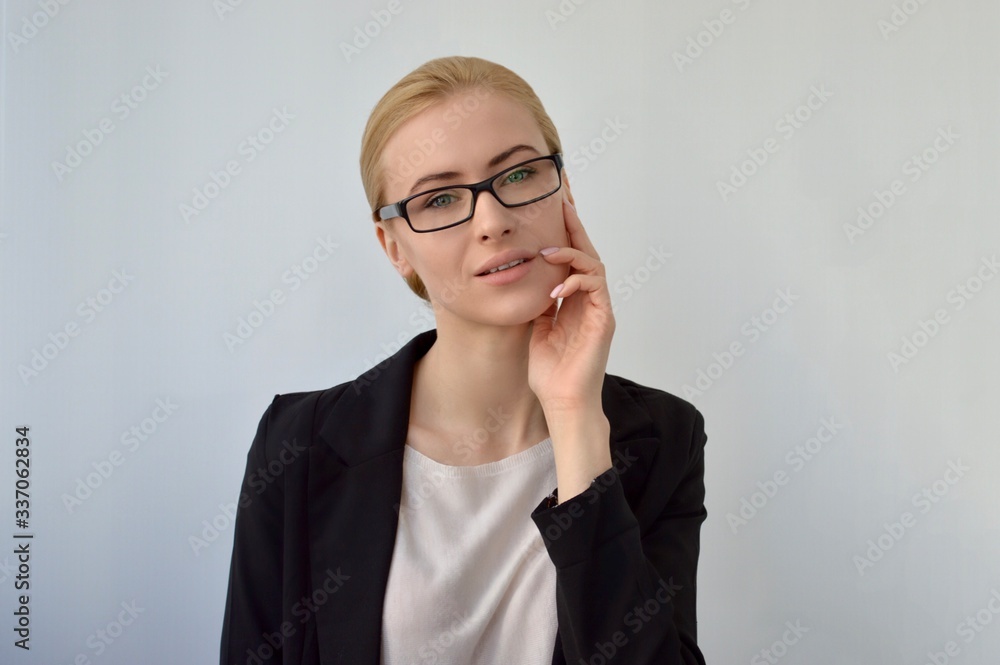 portrait of a young businesswoman with glasses portrait of a young businesswoman with glasses