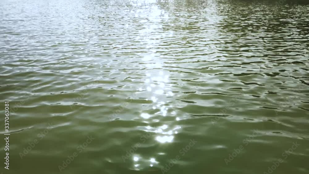 Glare of sunlight on the surface of the water Glare of sunlight on the surface of the water
