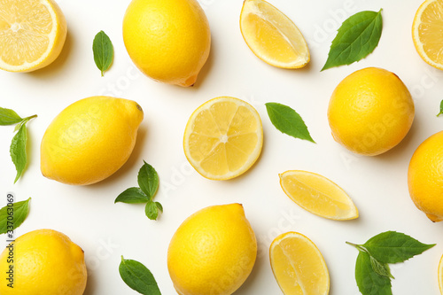 Flat lay with lemons on white background. Fresh fruit