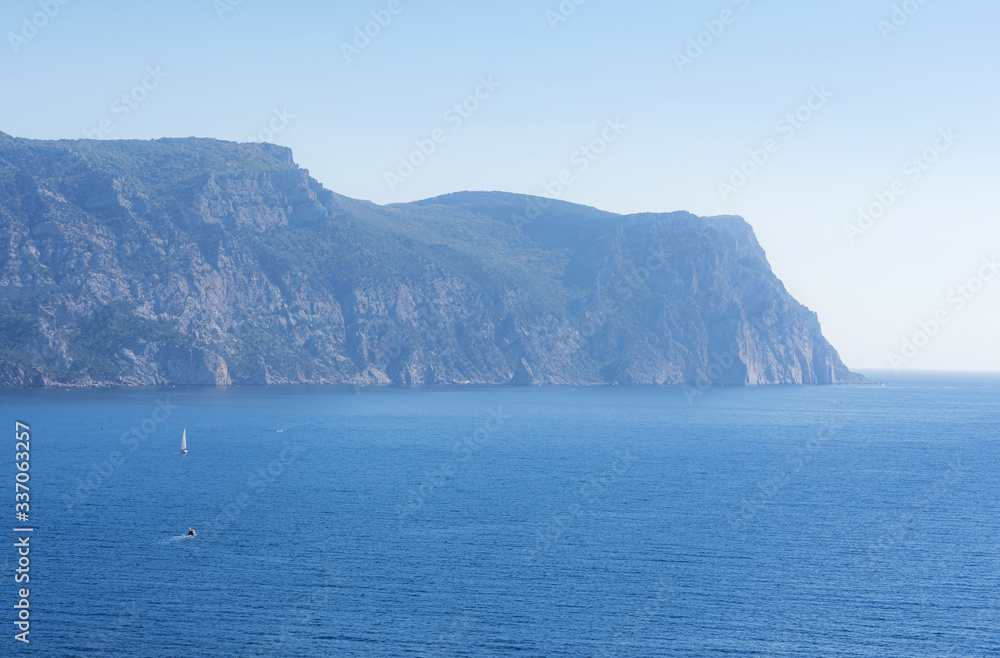 Cape Aya in Balaklava Bay, Crimea. Travel to Crimea. Seascape with a mountain.
