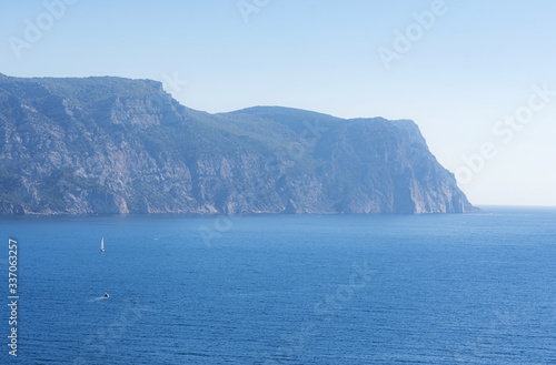 Cape Aya in Balaklava Bay, Crimea. Travel to Crimea. Seascape with a mountain.