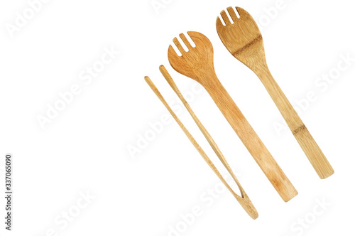 wooden tongs and large spoons for home cooking.