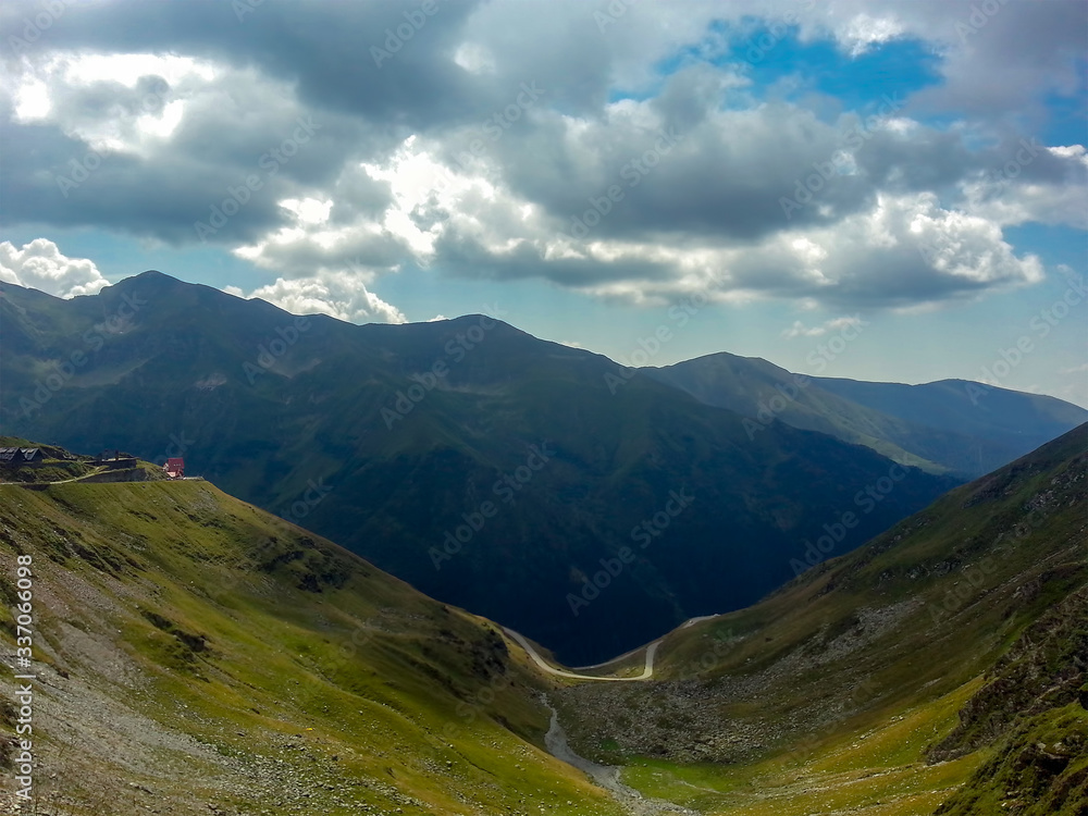 Fototapeta premium landscape with road through mountains