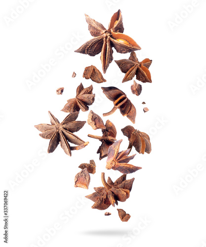 Tableau sur toile Crushed dry anise in the air isolated on white background