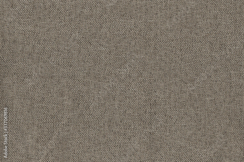 Fabric matting beige. The texture of the fabric is interlaced with large 