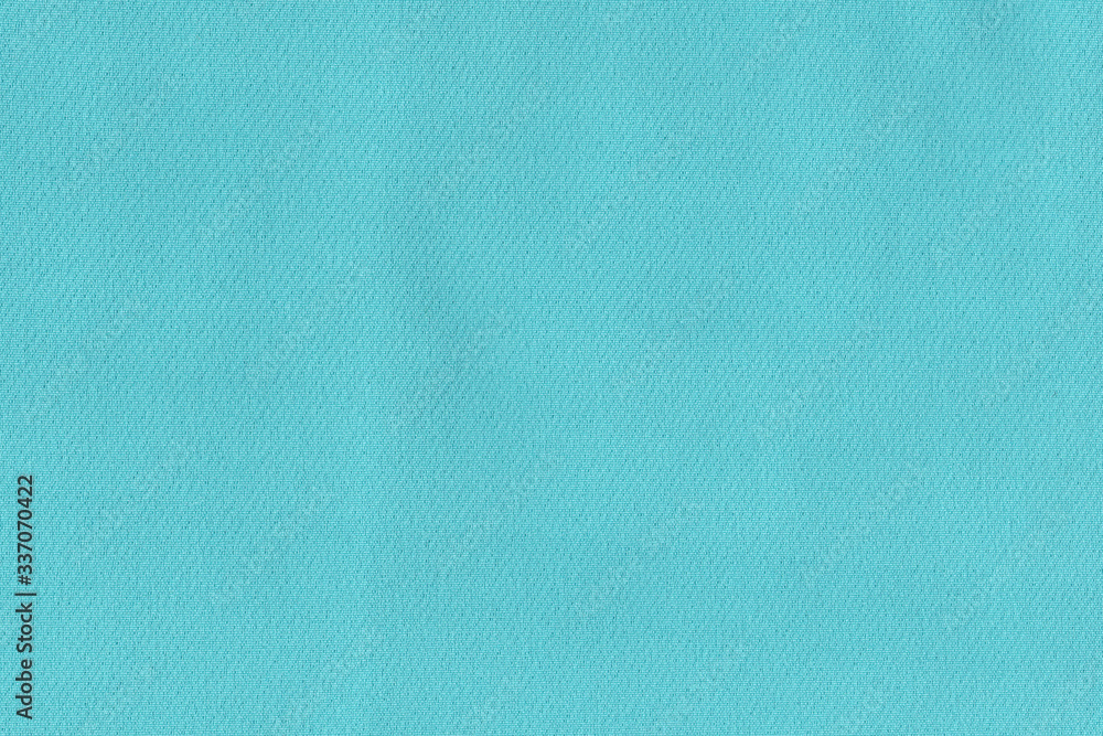Turquoise soft fabric. The texture of the plain fabric for the dress Turquoise soft fabric. The texture of the plain fabric for the dress