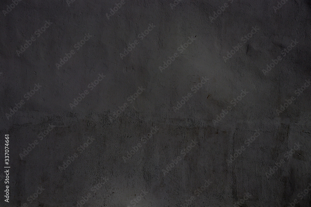 Vintage black background. Texture of dried black sheet of paper. Washed black paper texture