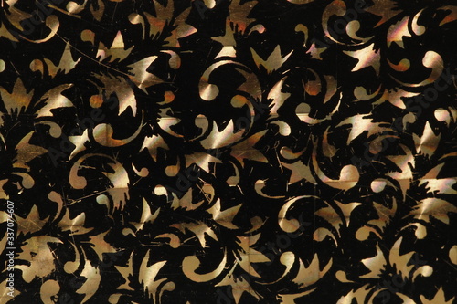 Pearle background processed with special paint on brass metal.