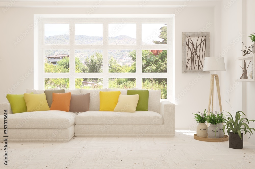 Fototapeta premium White living room with sofa and summer landscape in window. Scandinavian interior design. 3D illustration