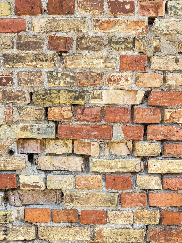 Obraz premium Background texture broken brick wall of an old house