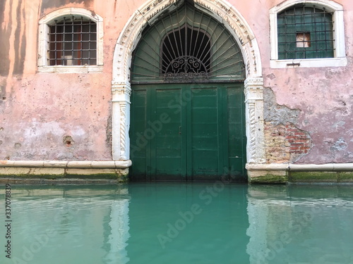 Old, historical, narrow water streets of Venice, with unique architecture. Venice, Italy, Europe © Artem