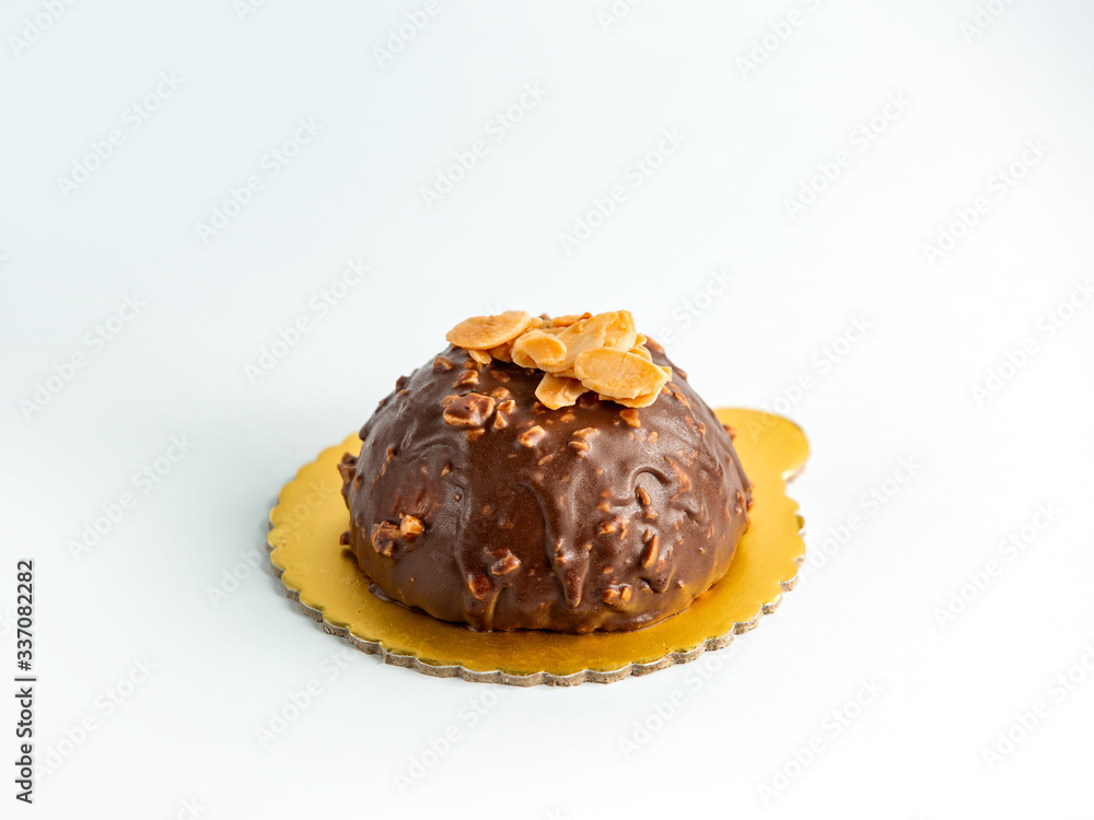 chocolate dipped cookie with peanuts on top chocolate dipped cookie with peanuts on top