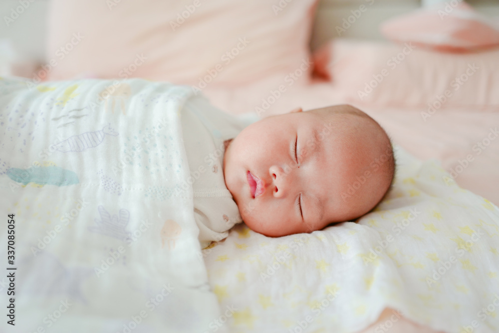 Baby girl sleeping on bed Baby girl sleeping on bed