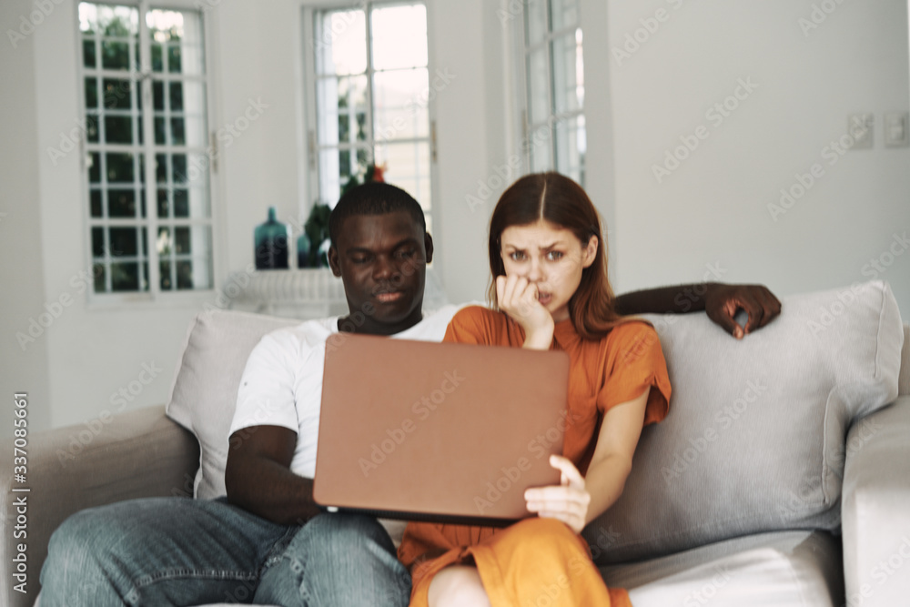 young couple using laptop young couple using laptop