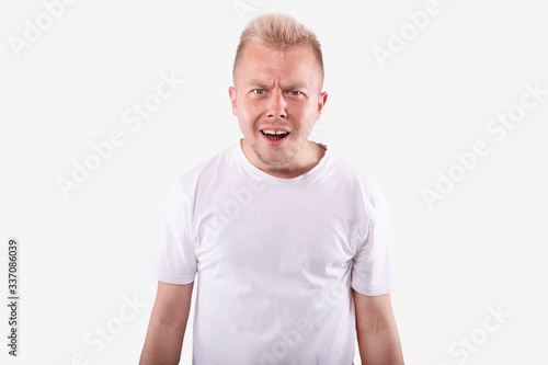 Caucasian man with opened mouth. Wtf facial expression. Human emotions