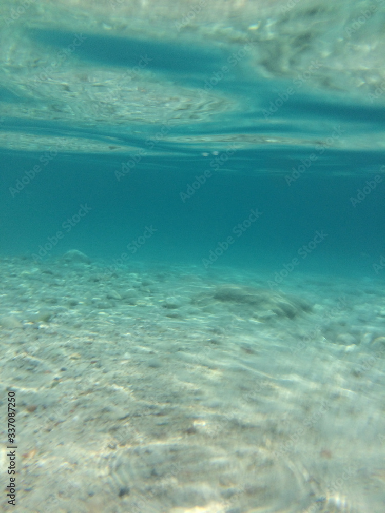 sea. blue sea. photo under water. blue sea and white sand