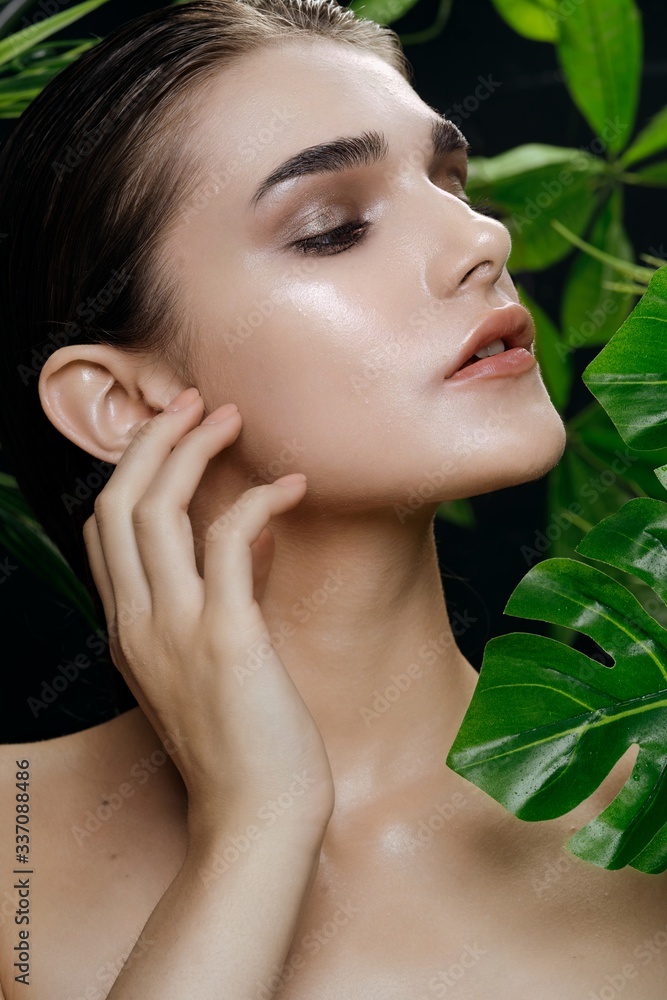 Beautiful woman naked shoulders green leaves luxury Beautiful woman naked shoulders green leaves luxury