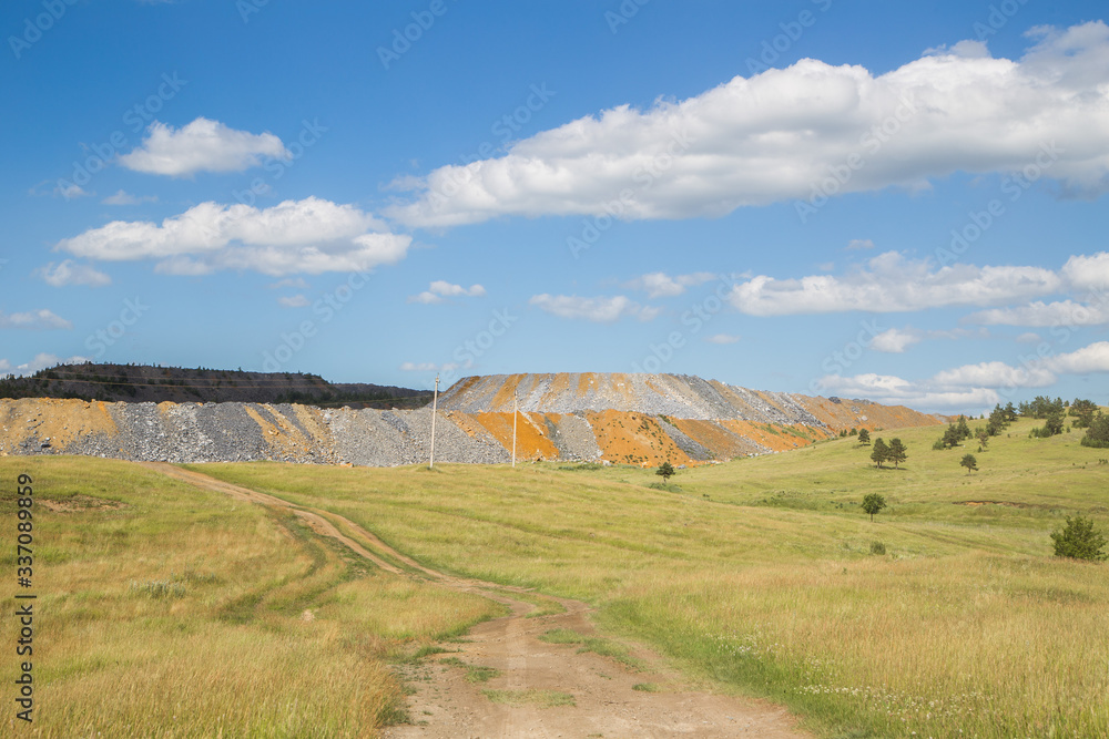 Fototapeta premium Large dump of stone at the mine site