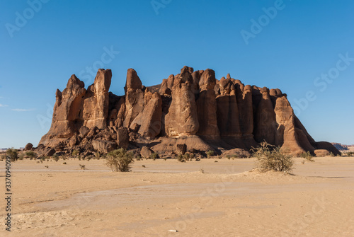 Sandstone pinnacles in the Sahara desert, blue sky, Chad, Africa