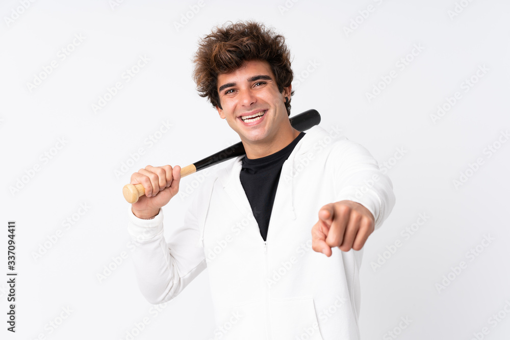 Young caucasian man over isolated white background playing baseball and pointing to the front Young caucasian man over isolated white background playing baseball and pointing to the front