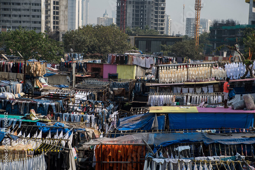 laundry hanging in downtown mumbai india photo