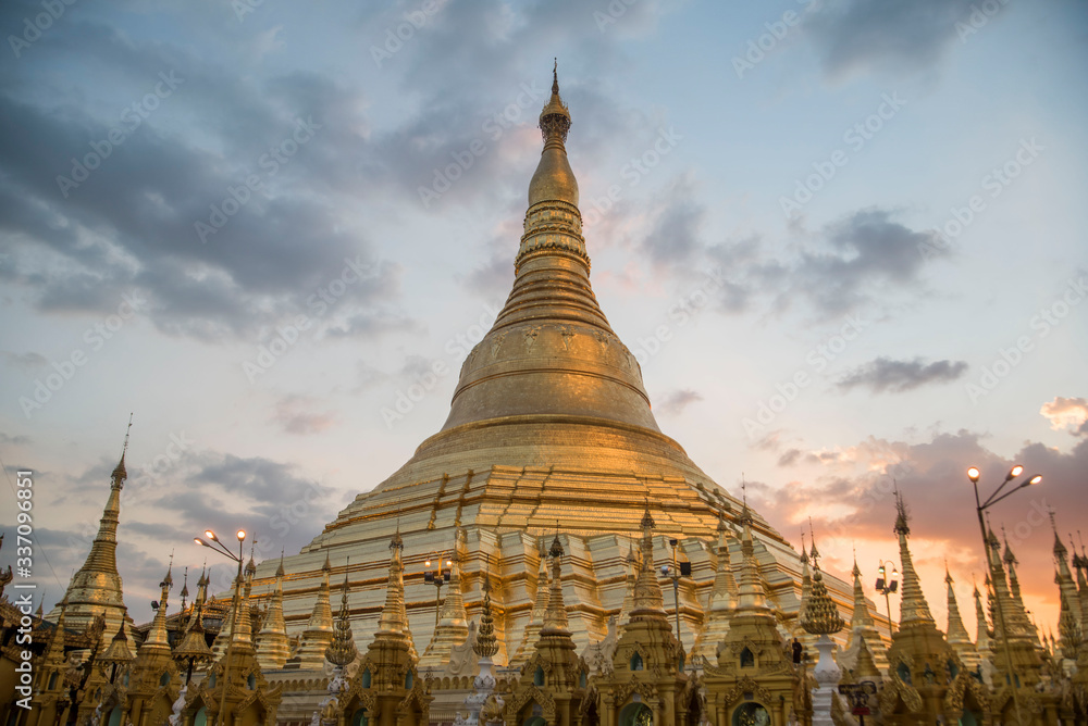 sunset over giant golden Shwedagon Pagoda in yangon myanmar
