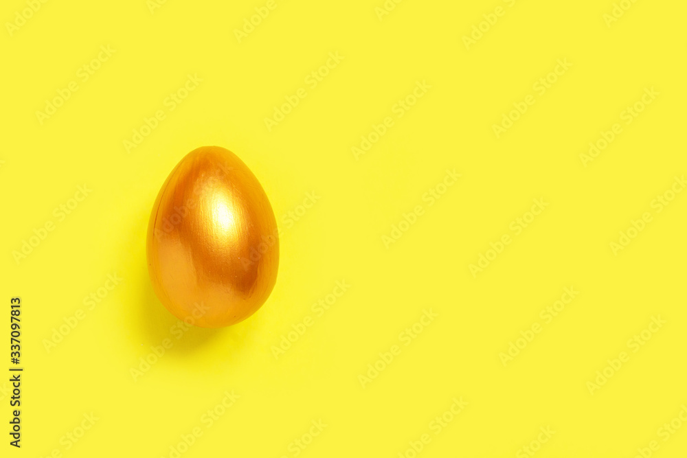 .Easter flat lay background of colorful eggs on a yellow background, Easter pattern top view with copy space. .Easter flat lay background of colorful eggs on a yellow background, Easter pattern top view with copy space.