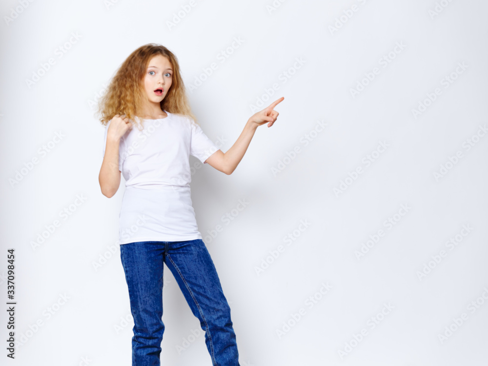 young woman pointing at something young woman pointing at something
