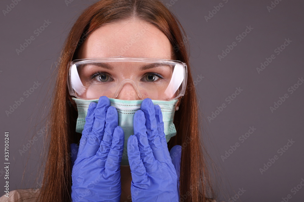 Close up of woman suiting mask against coronavirus (covid-19) Close up of woman suiting mask against coronavirus (covid-19)