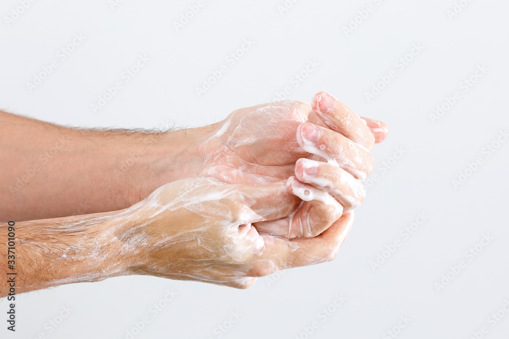 Close up image of washing hand against white background Close up image of washing hand against white background