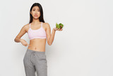 young woman holding a healthy food