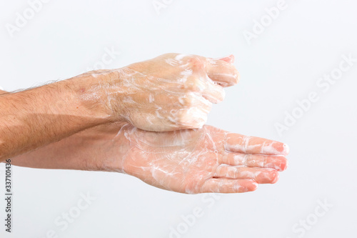 man washing hands isolated over white background