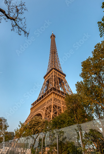 Eiffel tower against cloudy sky. Paris, France. © Telly