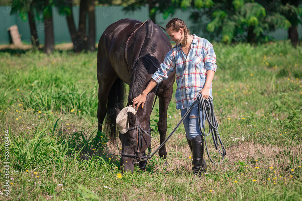Woman and horse, landscape, green field Woman and horse, landscape, green field