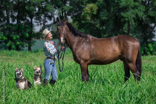  Woman, horse, dogs Huskies, landscape, stable
