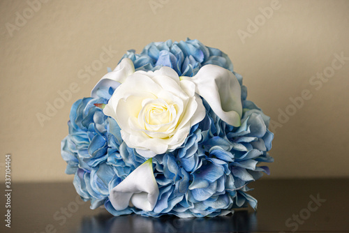 Bride's White and Blue Roses Bouquet Ball