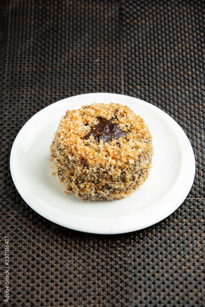 portioned chocolate cake with white cake sprinkles portioned chocolate cake with white cake sprinkles