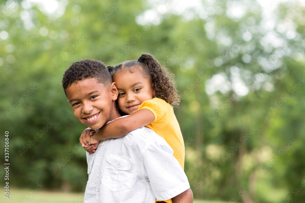 Portrait of a big brother and his little sister. Portrait of a big brother and his little sister.