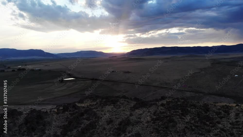 Colorful sunset over desert landscape in New Mexico, wide aerial Colorful sunset over desert landscape in New Mexico, wide aerial