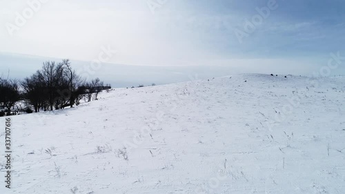 Aerial, snowy countryside